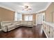 Spacious living room featuring hardwood floors, a ceiling fan, and a comfortable leather sectional sofa at 189 Ella Kinley Circle # 201, Myrtle Beach, SC 29588