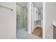 Bathroom with a glass shower and custom closet at 1936 Indigo Cove Ln, Calabash, NC 28467