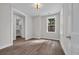 Neutral bedroom with walk-in closet and light fixture at 1936 Indigo Cove Ln, Calabash, NC 28467