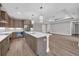 Modern kitchen featuring an island, stainless steel appliances, and sleek countertops at 1936 Indigo Cove Ln, Calabash, NC 28467