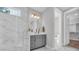 Sleek bathroom featuring glass shower, vanity with modern hardware, and a separate toilet room at 1940 Indigo Cove Ln, Calabash, NC 28467