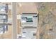 Aerial view of home showcasing backyard pool, patio, and gray roof at 1946 Indigo Cove Ln, Calabash, NC 28467