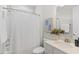 Bathroom with shower-tub combo, neutral wall color, and a single sink vanity at 1946 Indigo Cove Ln, Calabash, NC 28467