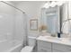 Bathroom with shower-tub combo, neutral wall color, and a single sink vanity at 1946 Indigo Cove Ln, Calabash, NC 28467