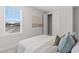 Bright bedroom with closet, ample window light and relaxing decor at 1946 Indigo Cove Ln, Calabash, NC 28467