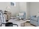 Cozy living room boasts hardwood floors, neutral decor, and ample natural light at 1946 Indigo Cove Ln, Calabash, NC 28467