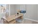 This office space features modern decor, a comfortable chair, and a wooden desk at 1946 Indigo Cove Ln, Calabash, NC 28467