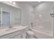 Spotless bathroom with a single vanity, shower-tub combo, and sleek fixtures at 200 Lister St, Conway, SC 29526