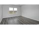 Well-lit bedroom with large windows and sleek, modern flooring at 200 Lister St, Conway, SC 29526