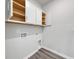 Laundry room featuring crisp white cabinets and washer dryer hookups at 200 Lister St, Conway, SC 29526