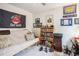 Bedroom decorated with comfortable couch and sports decor at 2016 Willow Run Dr. # B, Little River, SC 29566