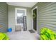 Inviting entryway with decorative accents and a welcoming wreath on the front door at 2016 Willow Run Dr. # B, Little River, SC 29566