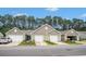 Charming townhomes featuring attached garages and meticulously landscaped front yards at 2016 Willow Run Dr. # B, Little River, SC 29566