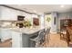 Kitchen island with bar seating, granite countertops, and stainless steel appliances at 2016 Willow Run Dr. # B, Little River, SC 29566