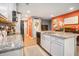 Bright kitchen with an island, granite countertops, stainless steel appliances, and eat in breakfast area at 2016 Willow Run Dr. # B, Little River, SC 29566
