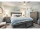 Comfortable bedroom featuring a ceiling fan, soft lighting, and neutral decor with a king size bed at 2016 Willow Run Dr. # B, Little River, SC 29566