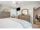 Bedroom featuring ample storage with dressers and a closet, along with a dedicated desk area at 2016 Willow Run Dr. # B, Little River, SC 29566