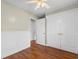 Bedroom with wood floors, a ceiling fan, and closet with bi-fold doors at 2096 Golden Leaf Rd., Galivants Ferry, SC 29544
