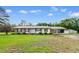 Charming single-story home with a metal roof, brick accents and a covered carport at 2096 Golden Leaf Rd., Galivants Ferry, SC 29544