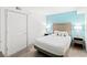 Cozy bedroom with a plush bed, modern lamps, and calming blue accents at 2301 S Ocean Blvd. # 621, Myrtle Beach, SC 29577