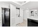Convenient laundry closet with stacked washer and dryer near kitchen at 2301 S Ocean Blvd. # 621, Myrtle Beach, SC 29577