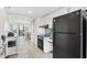 Functional kitchen featuring clean white cabinets, an efficient layout, and black appliances at 2401 S Ocean Blvd. # 351, Myrtle Beach, SC 29577