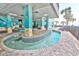 Indoor lazy river with artistically decorated columns and a brick-lined riverbed at a three-foot depth at 2401 S Ocean Blvd. # 351, Myrtle Beach, SC 29577