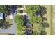 Aerial image of a home, highlighting the mature trees, roof, and surrounding neighborhood at 2519 Reta St., Conway, SC 29526