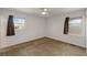 Bedroom with two large windows, ceiling fan and neutral carpet at 2519 Reta St., Conway, SC 29526