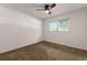 Cozy bedroom with neutral carpet, ceiling fan, and a bright window at 2519 Reta St., Conway, SC 29526