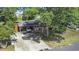 Aerial shot of the house showing the long driveway, front yard and covered parking area at 2519 Reta St., Conway, SC 29526