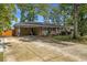Single-story brick home with spacious driveway, and attractive landscaping at 2519 Reta St., Conway, SC 29526
