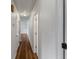 Hallway with hardwood floors, white walls, and recessed lighting leading to rooms at 2519 Reta St., Conway, SC 29526