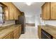 Efficient kitchen design featuring durable countertops, tile flooring, and stainless steel appliances at 2519 Reta St., Conway, SC 29526