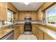 Functional kitchen with tiled floor, stainless appliances, and ample cabinet space at 2519 Reta St., Conway, SC 29526