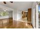 Bright living room with hardwood floors flows into the kitchen and dining areas at 2519 Reta St., Conway, SC 29526