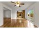 Open-concept living room and dining room with hardwood floors and natural light at 2519 Reta St., Conway, SC 29526