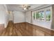 Inviting living room featuring hardwood floors, bright windows, and a ceiling fan at 2519 Reta St., Conway, SC 29526