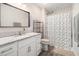Well-lit bathroom with a granite vanity, a framed mirror, and shower-tub combo at 2521 Wise Rd., Conway, SC 29526