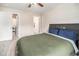 Spacious bedroom featuring an open closet with shelves and a connecting bathroom at 2521 Wise Rd., Conway, SC 29526