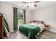 Cozy bedroom with hardwood floors, a window, and comfortable furnishings at 2521 Wise Rd., Conway, SC 29526