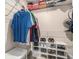 Walk-in closet with metal shelving and organizer system for shoes, bins and folded shirts at 2521 Wise Rd., Conway, SC 29526