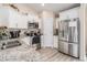 Modern kitchen featuring stainless steel appliances, granite countertops, and white cabinetry at 2521 Wise Rd., Conway, SC 29526