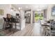 Modern kitchen open to the dining area and living room features stainless steel appliances and bar seating at 2521 Wise Rd., Conway, SC 29526