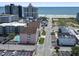 Expansive aerial shot captures the building's proximity to the beach and the vibrant surrounding cityscape at 2710 South Ocean Blvd. # 208, Myrtle Beach, SC 29577
