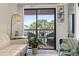 Relaxing view from the balcony featuring outdoor seating with palm trees in a tropical location at 2710 South Ocean Blvd. # 208, Myrtle Beach, SC 29577