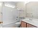 Bathroom featuring a combined shower and tub with updated fixtures, and a wood vanity at 2995 Woodberry Ct., Little River, SC 29566