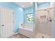 Bathroom with a soaking tub, a decorative stained glass window, and a separate tiled shower at 2995 Woodberry Ct., Little River, SC 29566