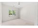 Bedroom with a ceiling fan and window providing ample natural light at 2995 Woodberry Ct., Little River, SC 29566