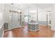 Elegant living room with unique architectural details and hardwood flooring at 2995 Woodberry Ct., Little River, SC 29566